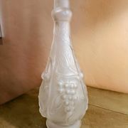 Frosted transparent glass carafe with raised cherry and grape patterns.