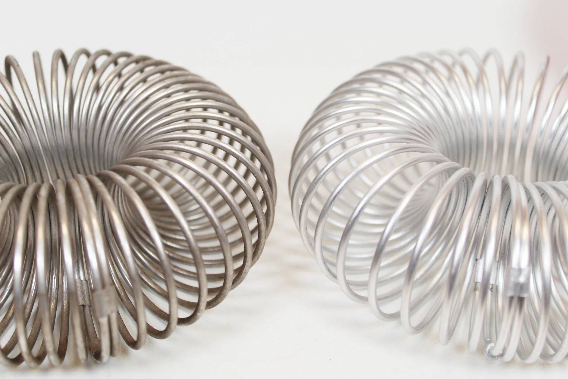Pair of Space Age 'Spring' wall lamps by ELEKTROFÉM, Hungary, 1970s.