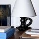 Lampe en céramique noire formant bougeoir