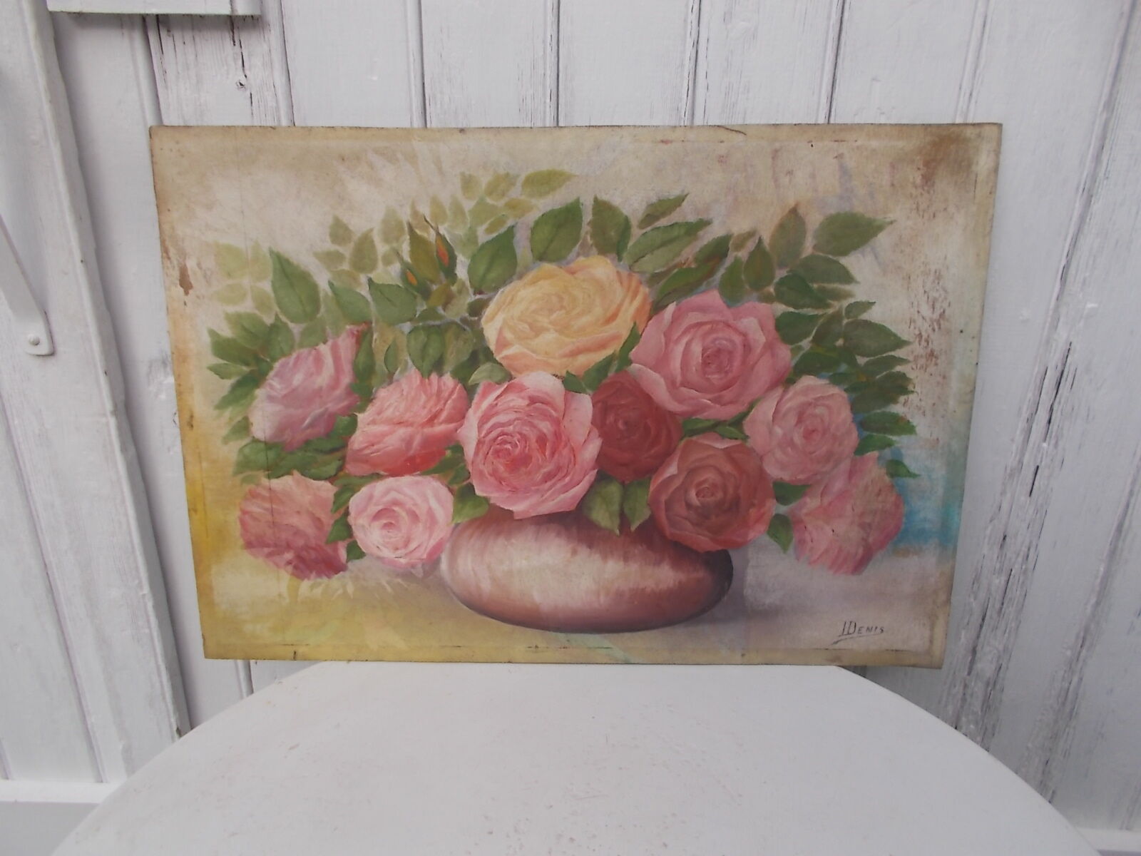 Tableau of a bouquet of flowers on a double-sided wooden panel.