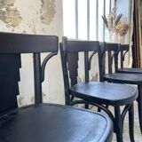 Set of 7 black bistro chairs