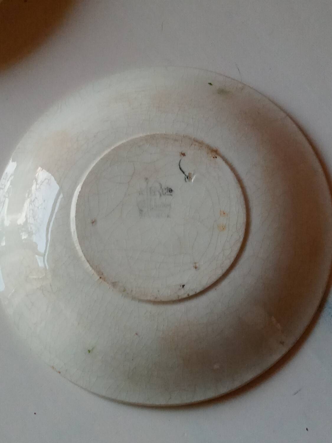 Two earthenware plates, H B, Choisy le roi