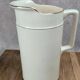 Large antique jug from Sarreguemines with golden trim.