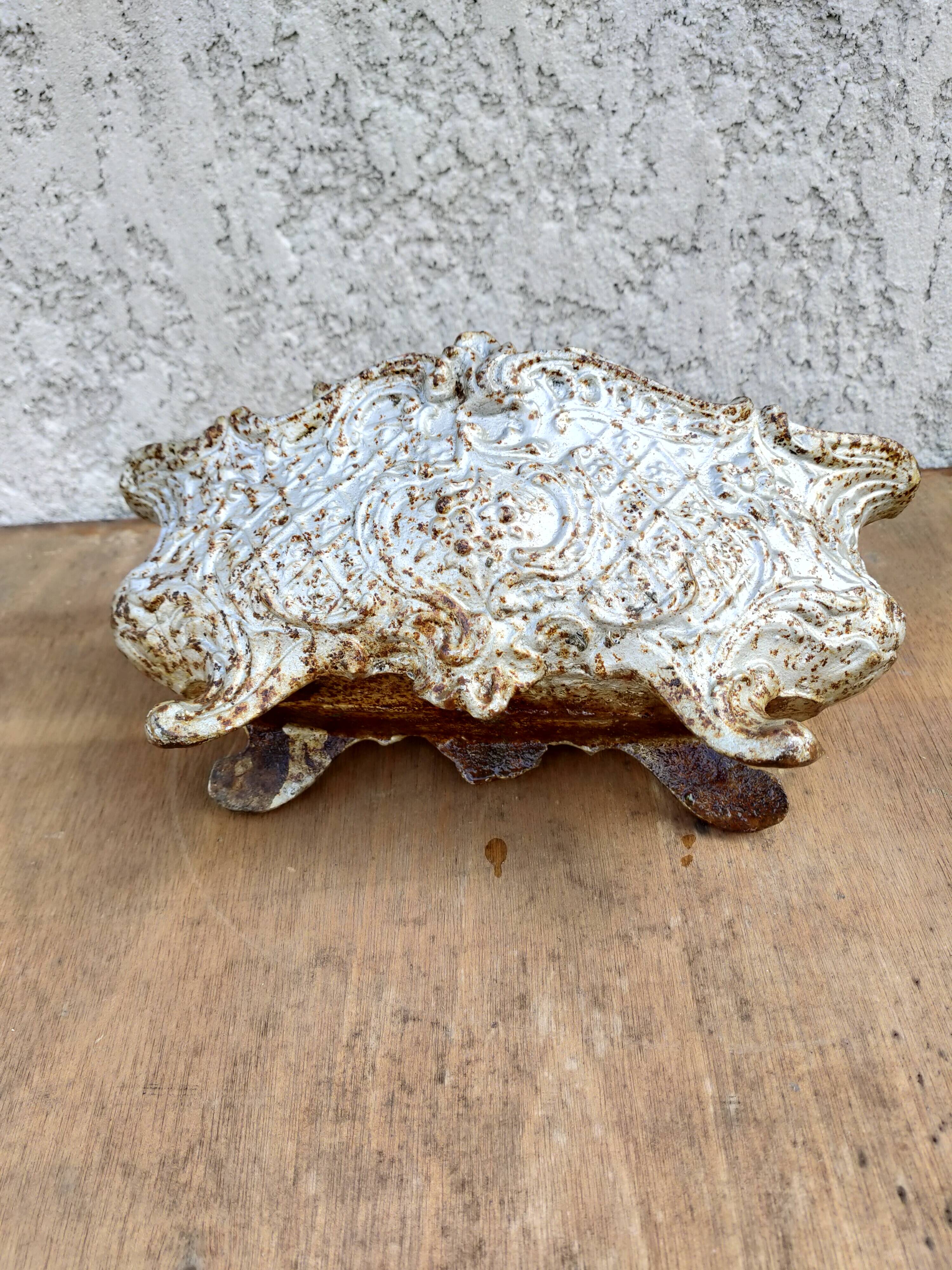 old cast iron planter