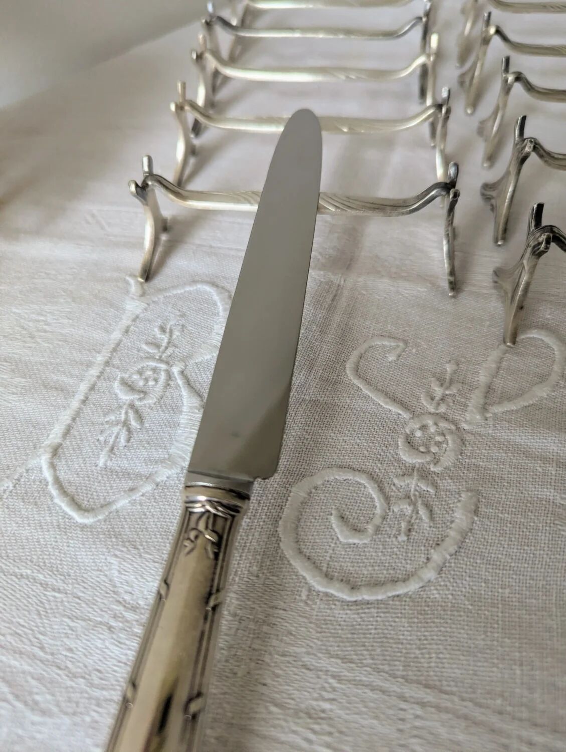 Set of 12 Christofle knife rests, Moderne 1912 model