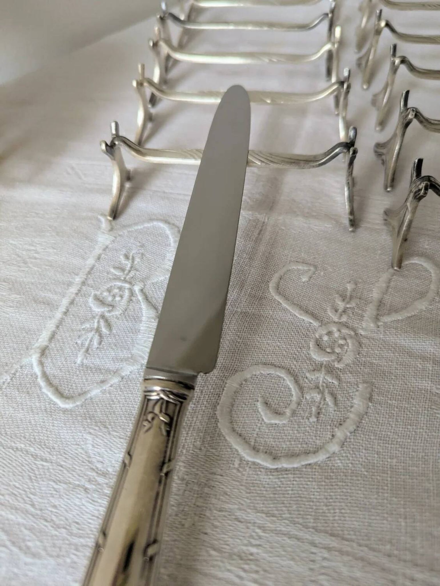 Set of 12 Christofle knife rests, Moderne 1912 model