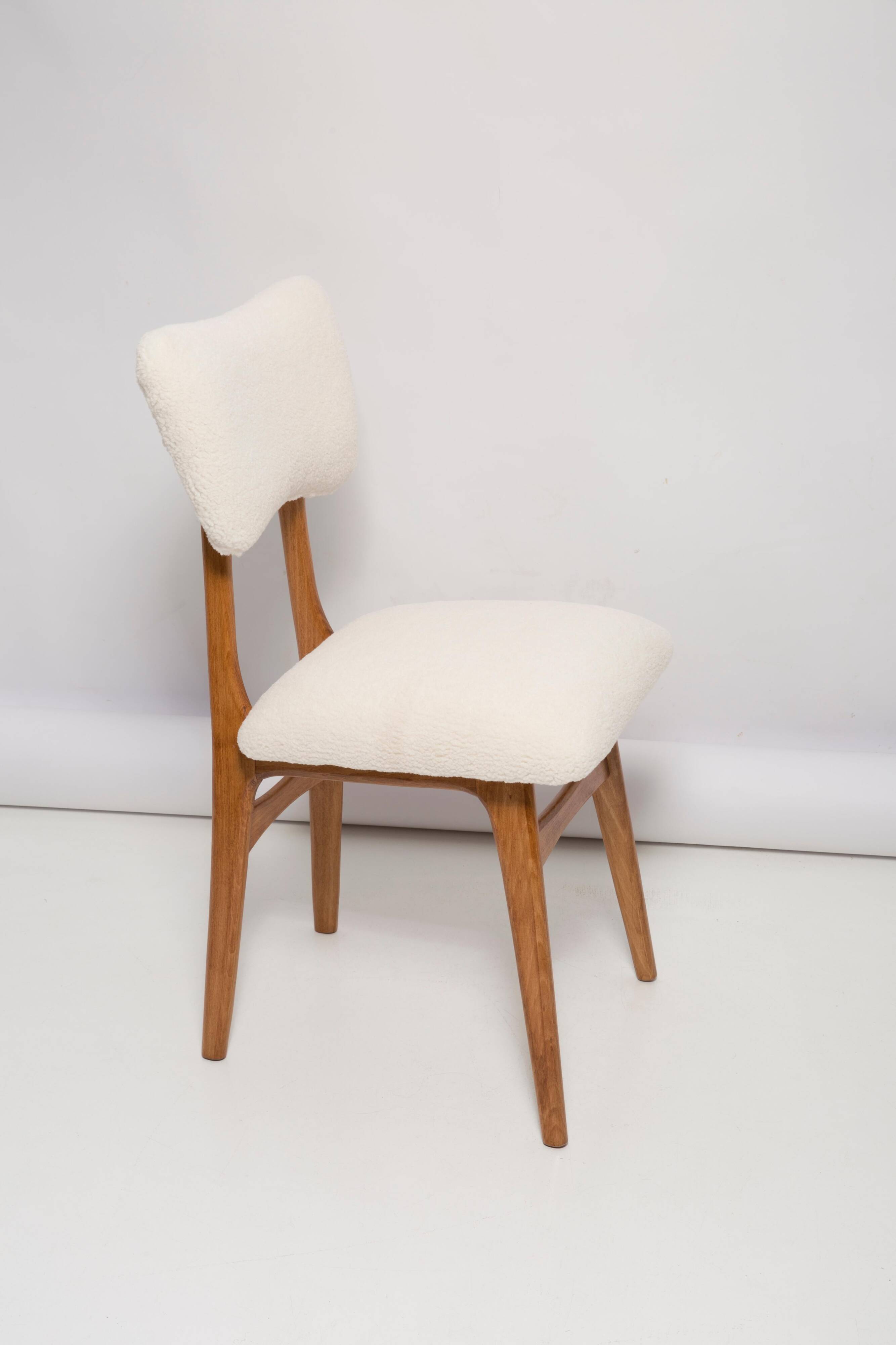 Butterfly chair in beech wood and cream boucle, Europe, 1960