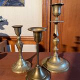 Trio of brass candlesticks