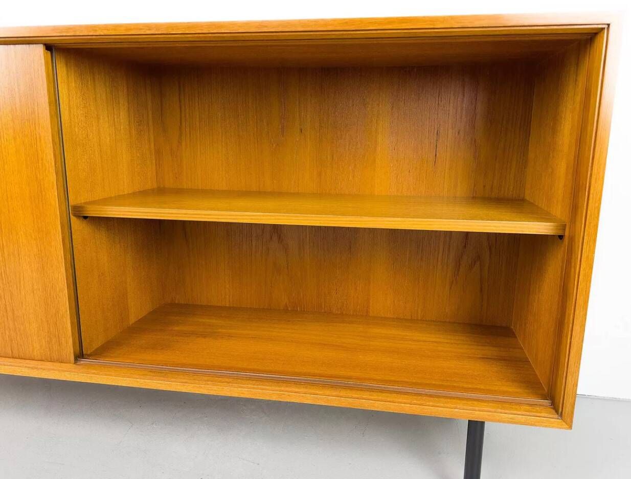 Vintage teak sideboard with sliding doors 1970s