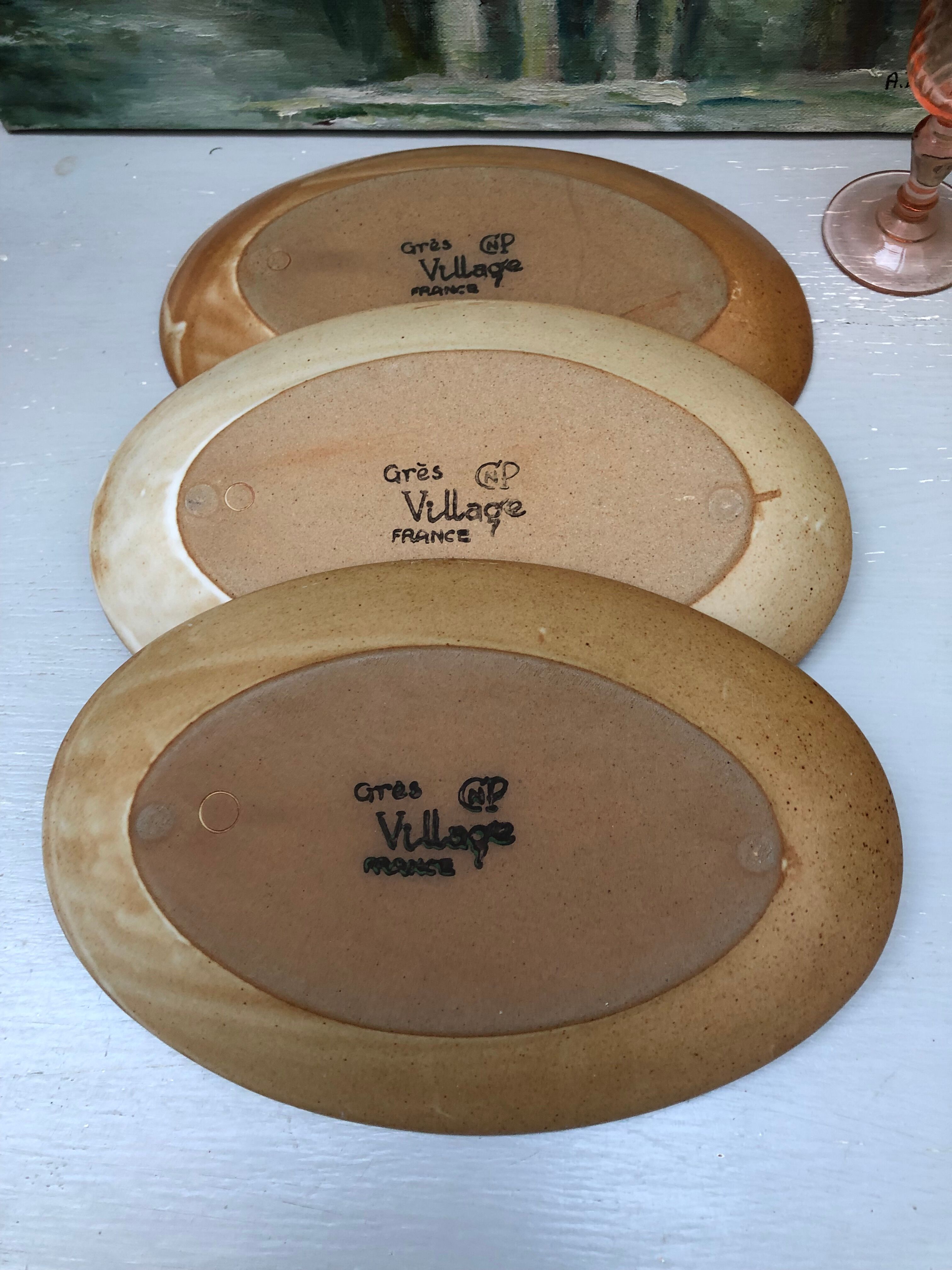 Set of three stoneware dishes village france
