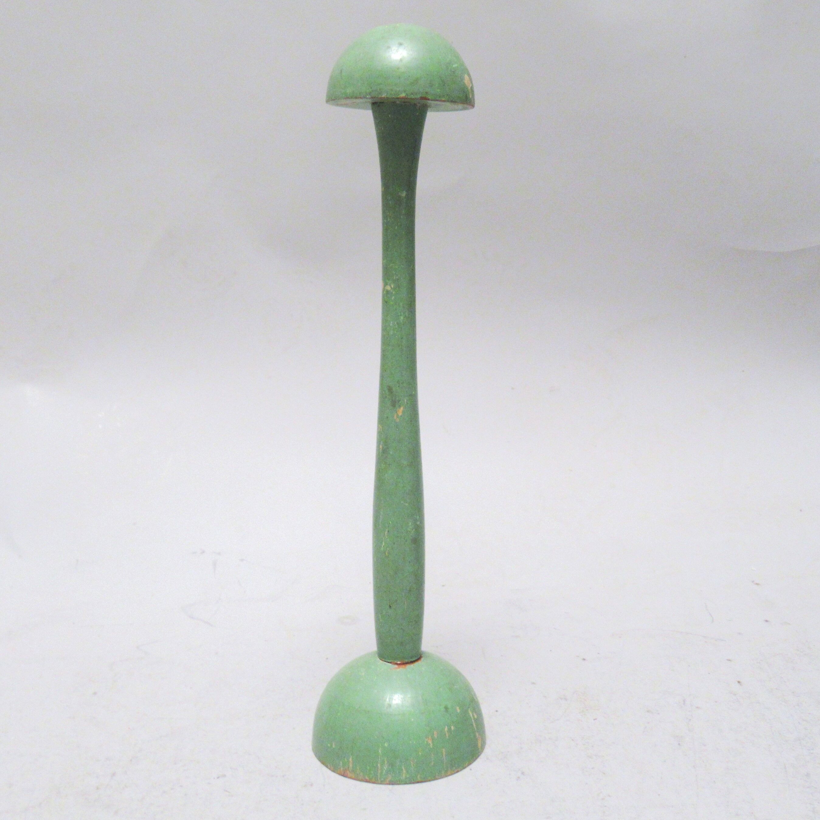 Green wooden hat holder