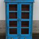 Old wooden glazed cabinet with two doors and two drawers