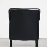 Luxurious and comfortable sheepskin armchair in a unique, stately black color