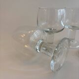 Set of 4 stemmed glasses. In good condition with some signs of wear.