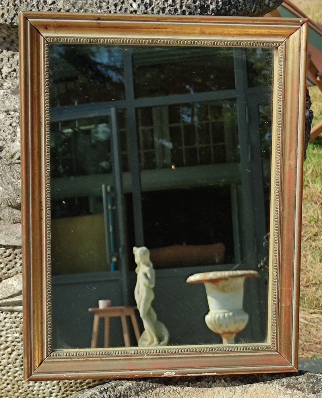 Old little gilded mirror