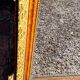 Authentic original Italian fireplace mirror, frame and pediment.