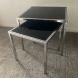 Pair of nesting tables in chromed metal and glass