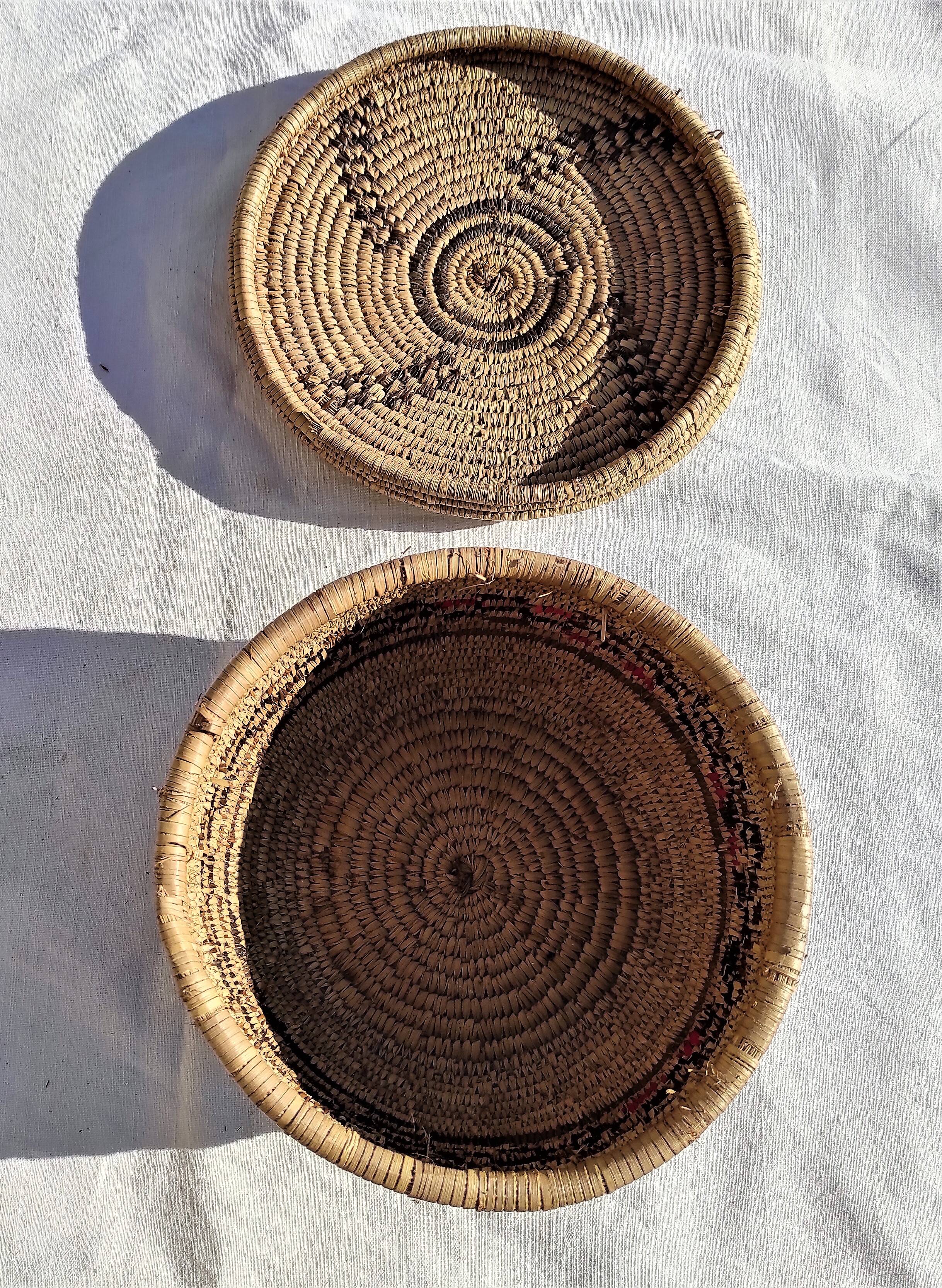 Antique basket with ethnic lid with black/brown and red décor