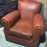 Club armchair moustache in brown leather
