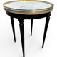 Bouillotte table in Louis XVI style made of blackened wood, marble, and brass.