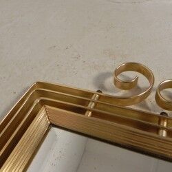 Vintage faceted mirror in an aluminium frame