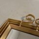 Vintage faceted mirror in an aluminium frame