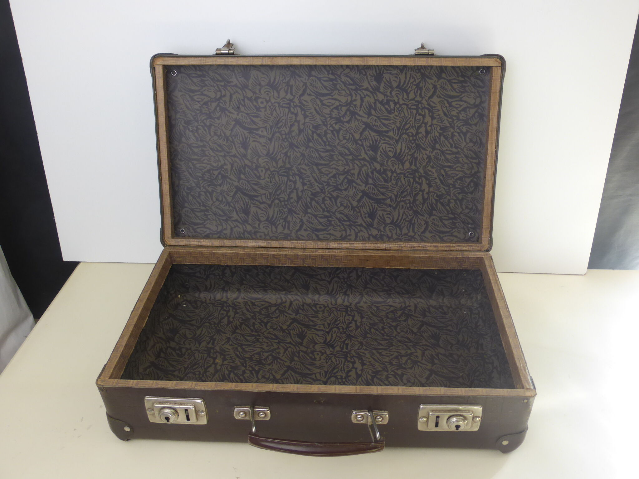 Old brown cardboard suitcase imitating the croco 50s/60s