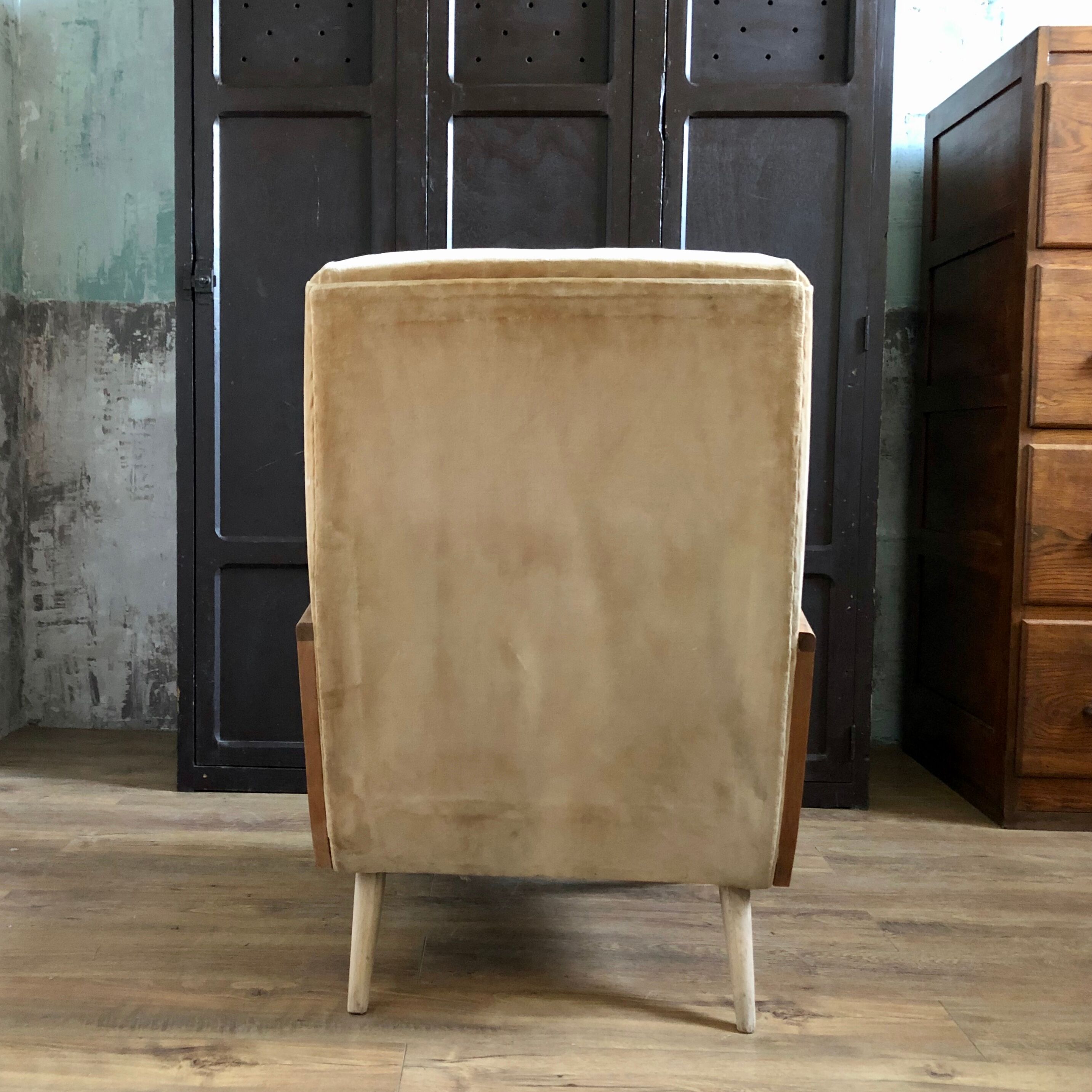 Velvet and wood armchair
