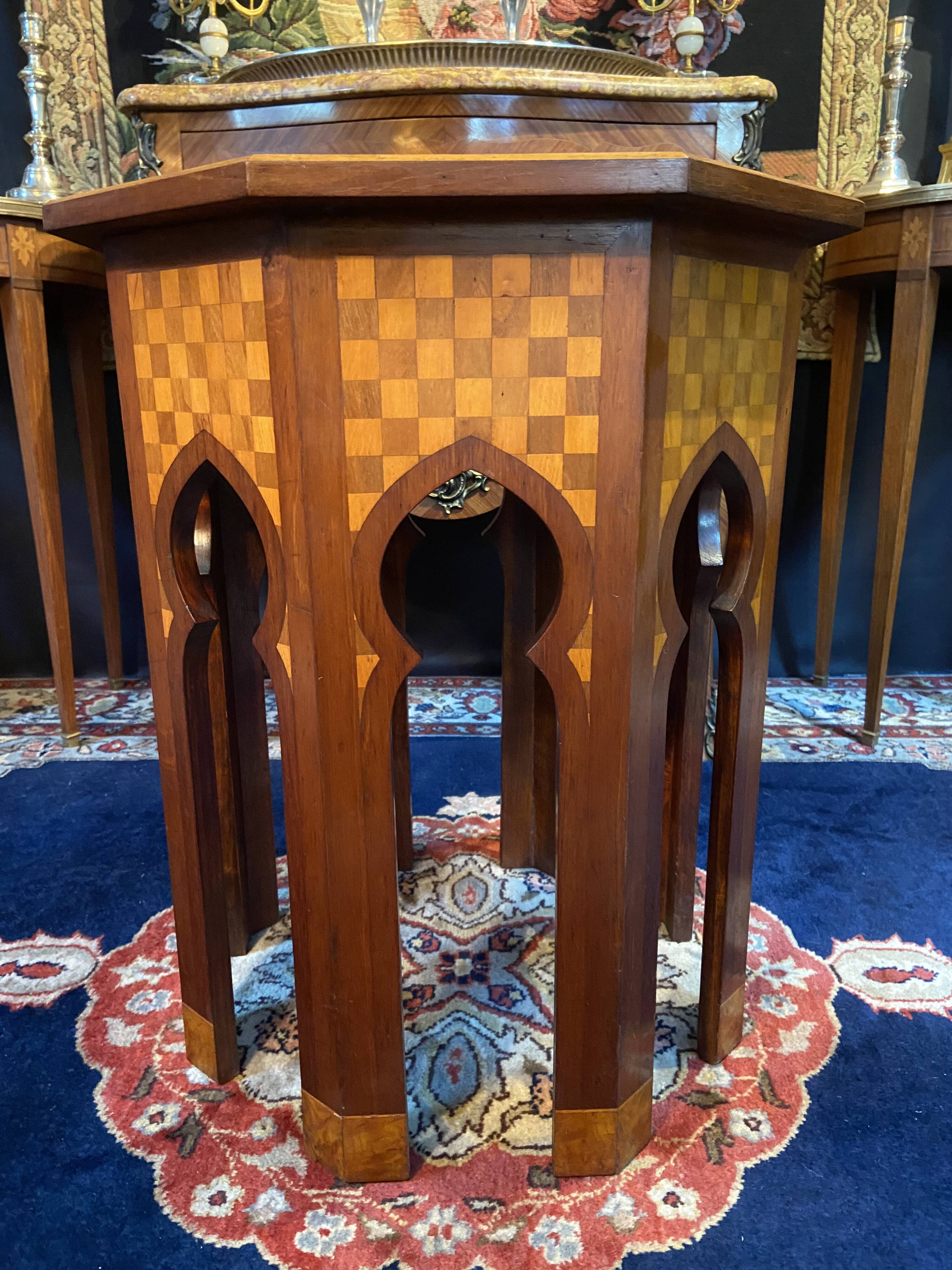Thuyawood tea table with marquetry decoration.