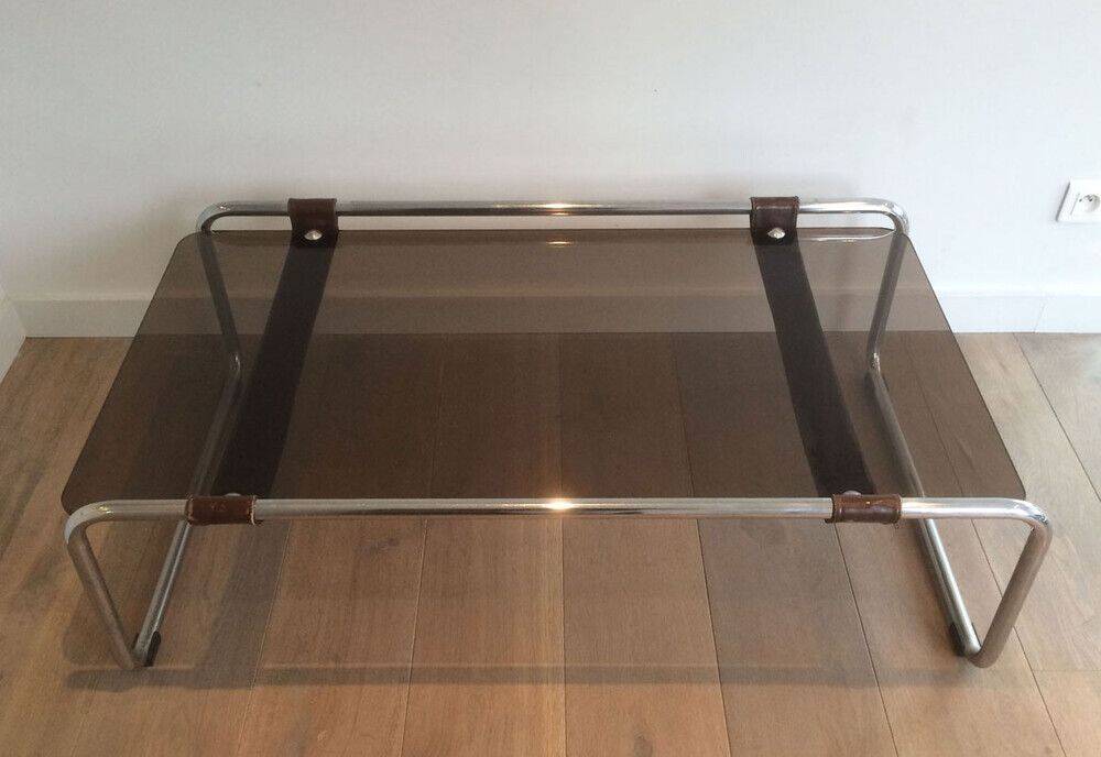 Coffee table in chrome, leather, and smoked glass