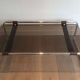 Coffee table in chrome, leather, and smoked glass