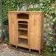 Asymmetrical Art Deco glass-fronted Parisian wardrobe in raw oak, 1930.