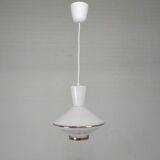 UFO-shaped pendant lamp with white glass on top and clear glass with white