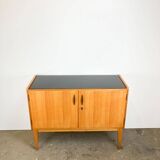 Small sideboard, WK Möbel, light coloured veneer with black glass top, 50s