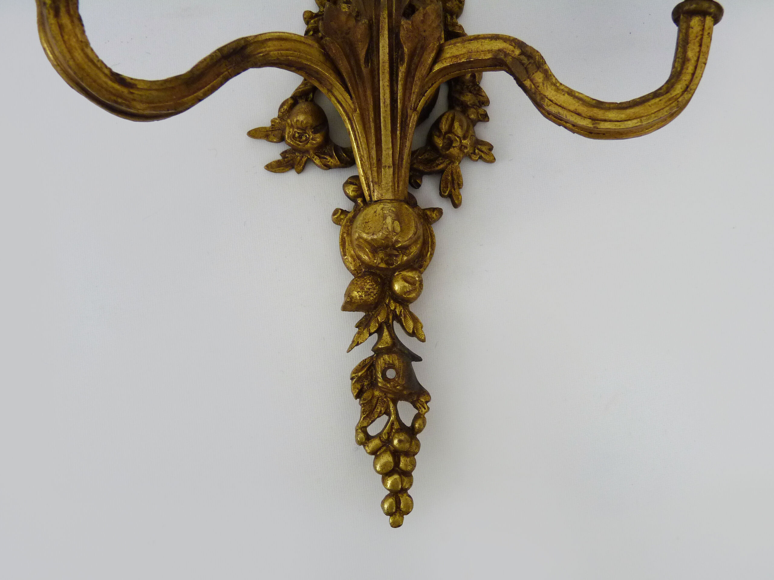 Vintage wall lamp decorated with ribbon and grape. Louis XVI style. XIXth