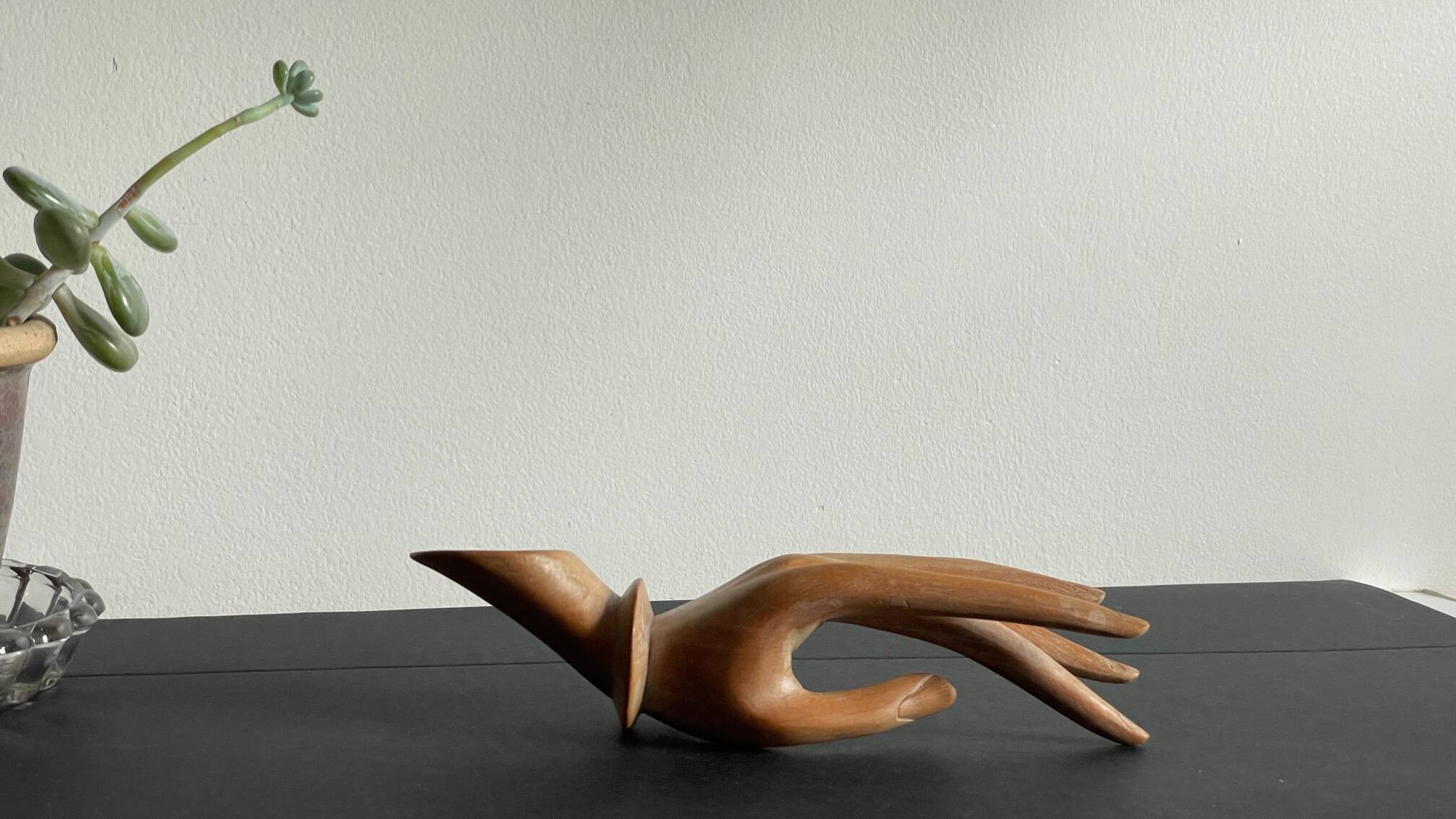 Wooden hand sculpture