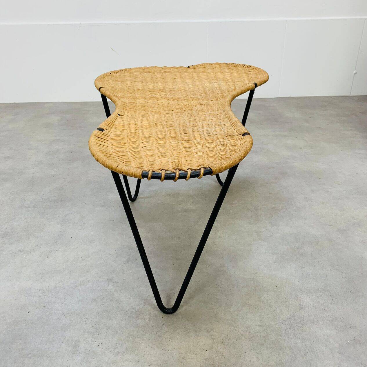 Raoul Guys coffee table, free form, wicker and metal, 1960s.