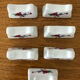 7 portes couteaux vintage en porcelaine décor floral