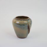 Small beige glazed ceramic vase with abstract relief pattern