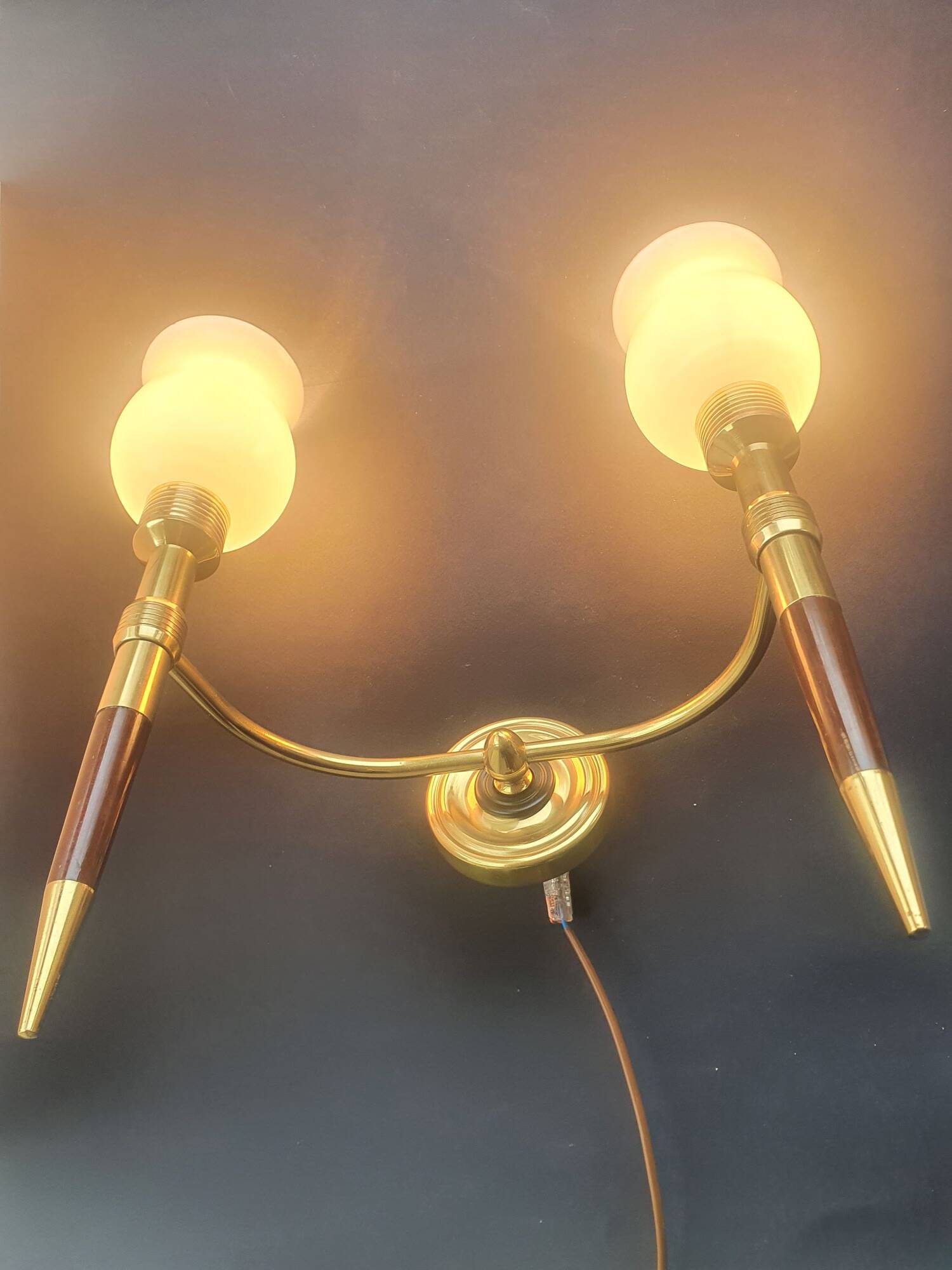 Large wall sconces torch style from the 1950s.