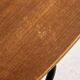 Teak chair with writing tablet