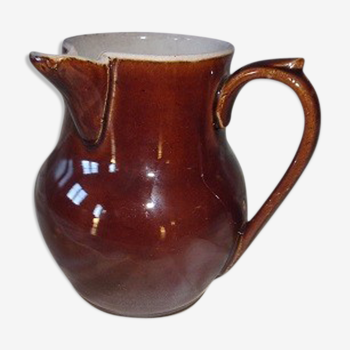 Old pitcher in ceramic