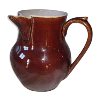 Old pitcher in ceramic