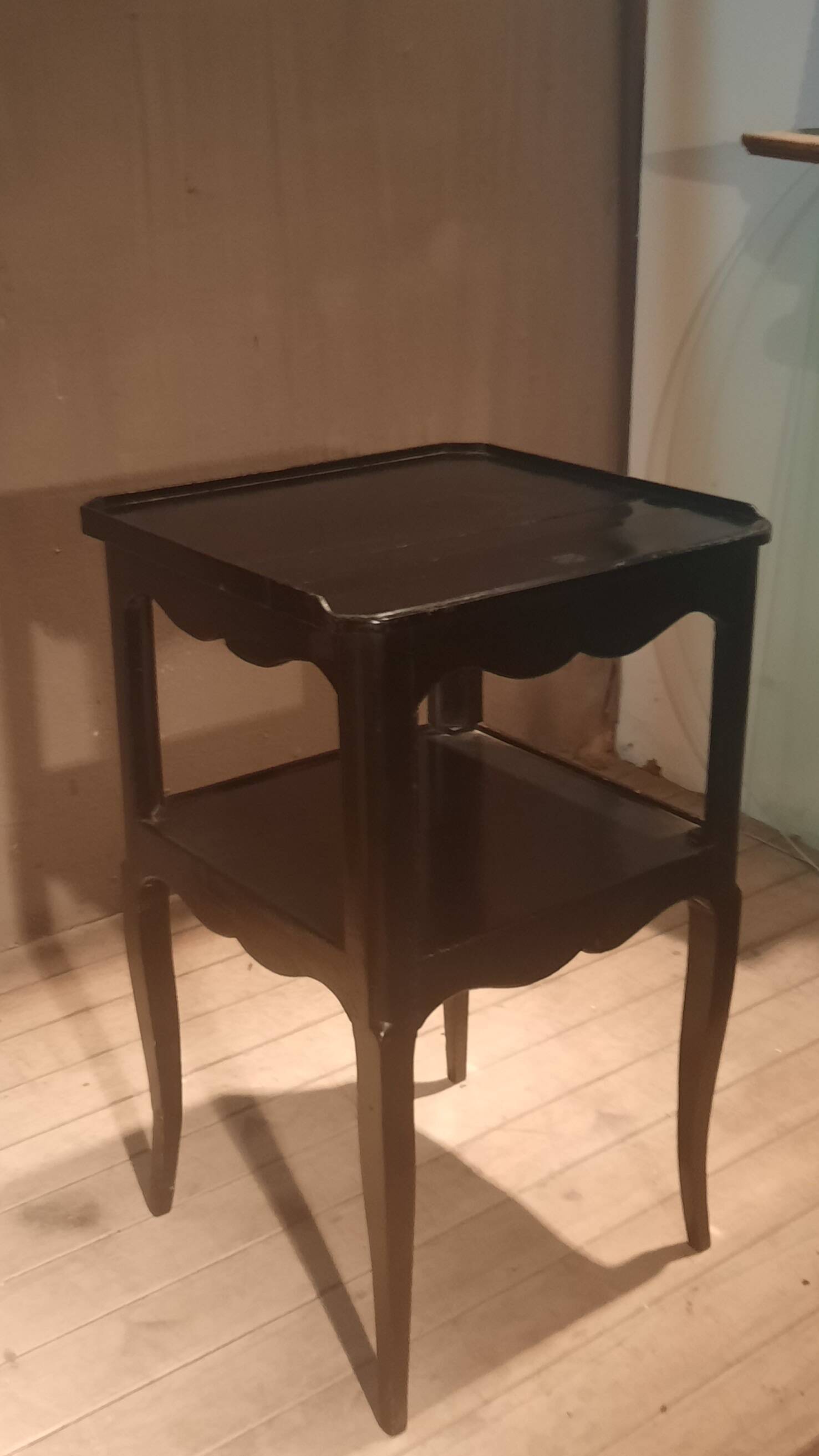 Black bedside table with two shelves, Louis XV style