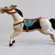 Pair of large hand-painted Indonesian horses with saddle