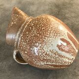 Pitcher in brown sandstone with effect of dripping and white speckling