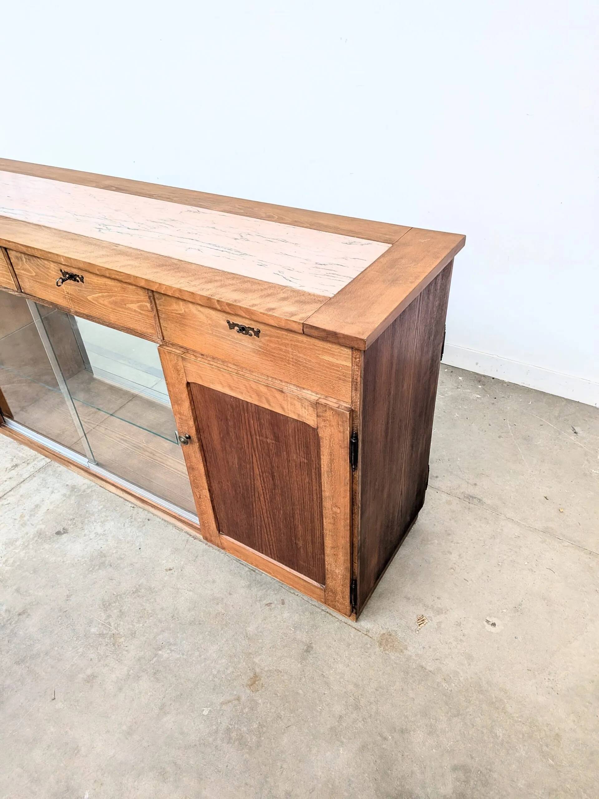 Double-sided counter in wood and pink marble (233 cm)