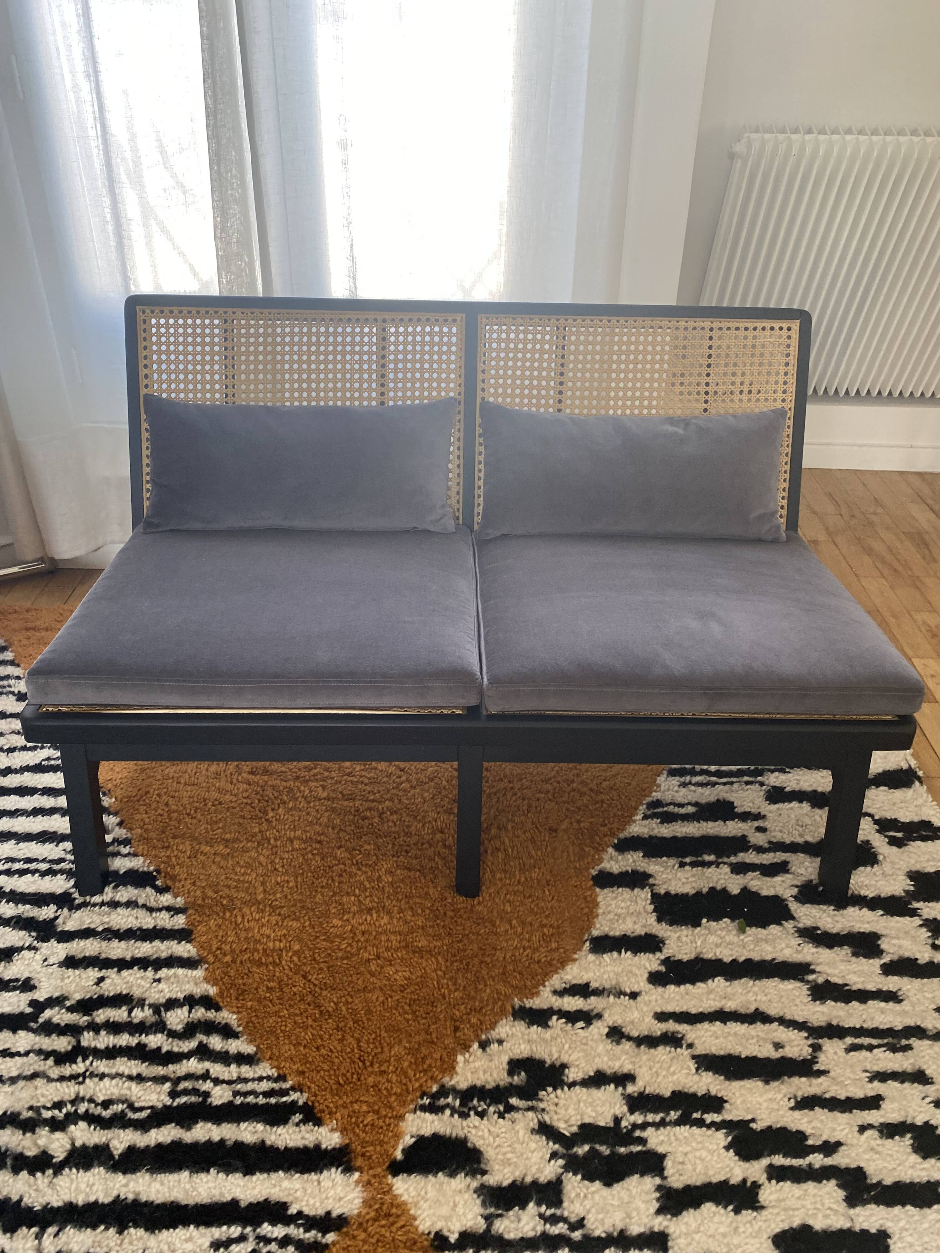 Black lacquered oak 2-seater bench with caning and lalala velvet.
