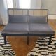 Black lacquered oak 2-seater bench with caning and lalala velvet.