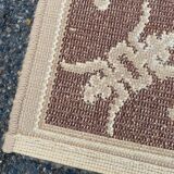 Persian rug in beige wool with woven flowers 290x190cm